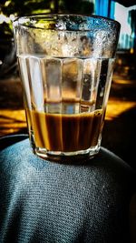 Close-up of beer glass on table