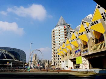 Buildings against clear blue sky