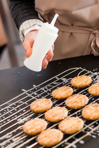 Close-up of person preparing food