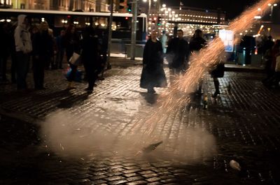 People in city at night