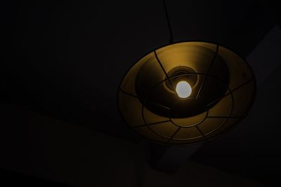 Low angle view of illuminated light bulb