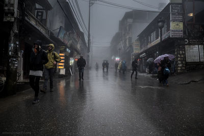 People walking on city street