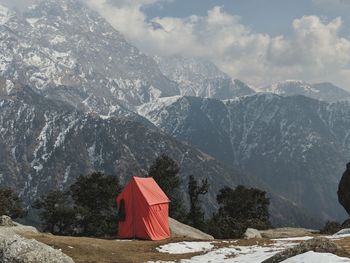 Scenic view of snowcapped mountains against sky