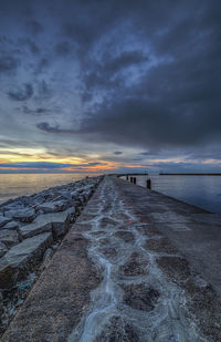 Scenic view of beach against sky during sunset