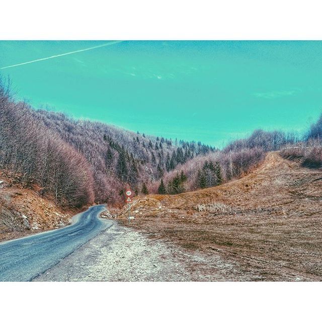 transportation, the way forward, road, clear sky, tranquility, landscape, tranquil scene, blue, nature, country road, scenics, beauty in nature, water, diminishing perspective, non-urban scene, mountain, day, transfer print, sky, auto post production filter