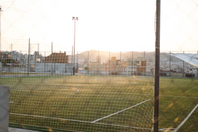 View of soccer field against sky