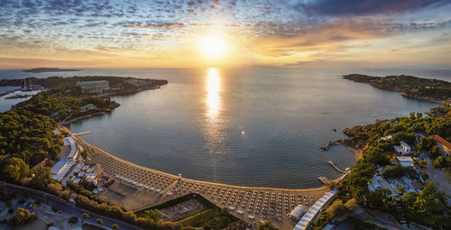 High angle view of sea against sky during sunset