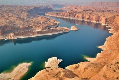 Scenic view of river flowing through canyon