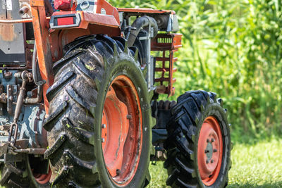 Close-up of tractor on field