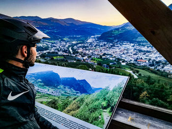 Man looking at mountains