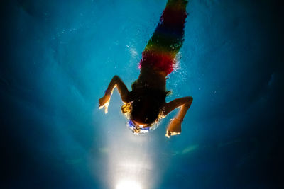 Girl swimming in sea