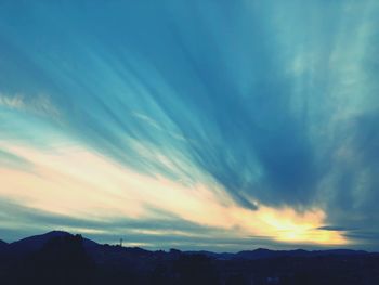 Scenic view of landscape against sky during sunset