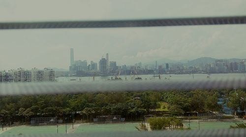 View of cityscape with river in background