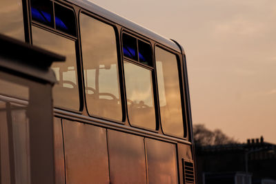 Close-up of train against sky