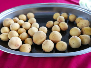 High angle view of eggs in container on table