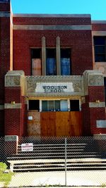 Text on building against sky