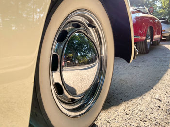 Perfectly restored classic car, wheel with a chrome-plated rim, porsche.