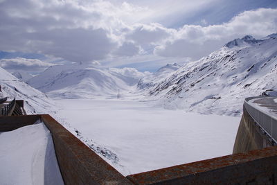 Scenic view of snowcapped mountains against sky