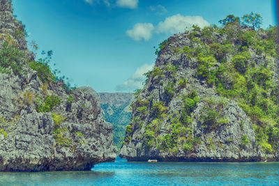 Scenic view of bay against sky