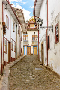 Narrow alley along buildings