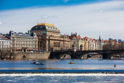 Beautiful old town of prague city, vltava river and the iconic charles bridge seen from kampa park