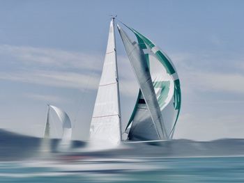 Scenic view of sailboat against sky