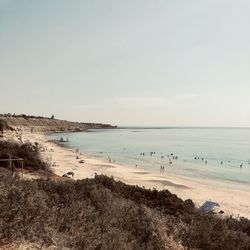 Scenic view of beach against clear sky