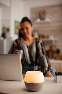 Young man using laptop at home