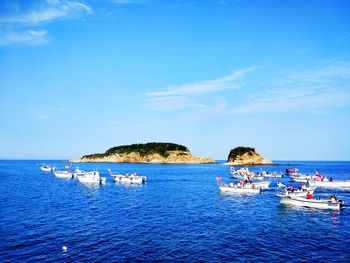 Scenic view of sea against blue sky