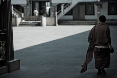 Woman looking at city