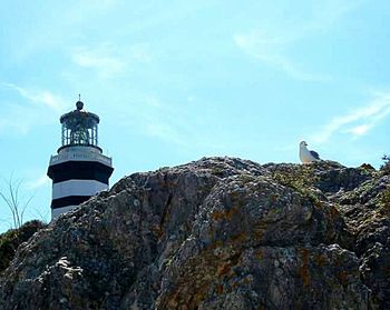 Low angle view of lighthouse against clear sky