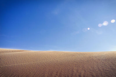 Scenic view of desert against sky