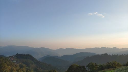 Scenic view of mountains against sky during sunset