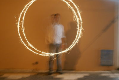 Blurred motion of man at night