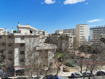 Buildings against blue sky