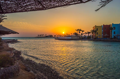 Scenic view of sea against sky during sunset