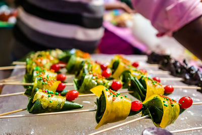 Close-up of chopped fruits on table