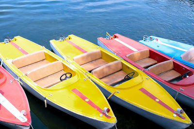 High angle view of colorful boats moored in lake