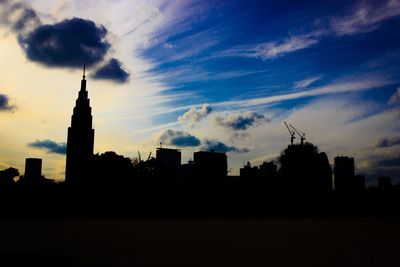 Silhouette of buildings at sunset