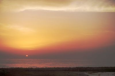 View of calm sea at sunset