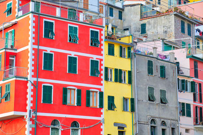 Low angle view of multi colored buildings in city