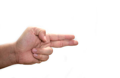 Close-up of hands against white background