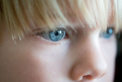 Cropped image of thoughtful boy looking away