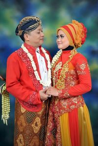 Bride and bridegroom in wedding dress during ceremony