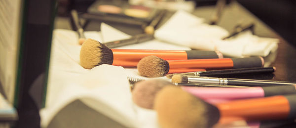 Make-up brushes on table