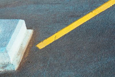 High angle view of yellow road marking