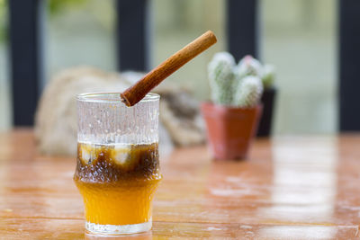 Close-up of beer glass on table