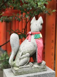 Close-up of statue against plants