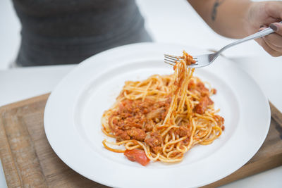 Close-up of noodles served in plate on table