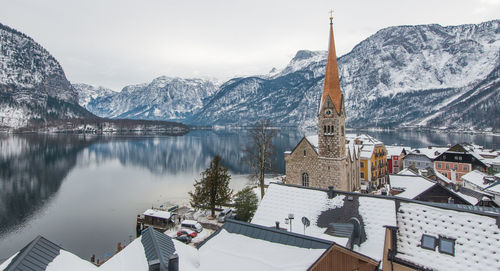 Scenic view of snow covered mountains against sky